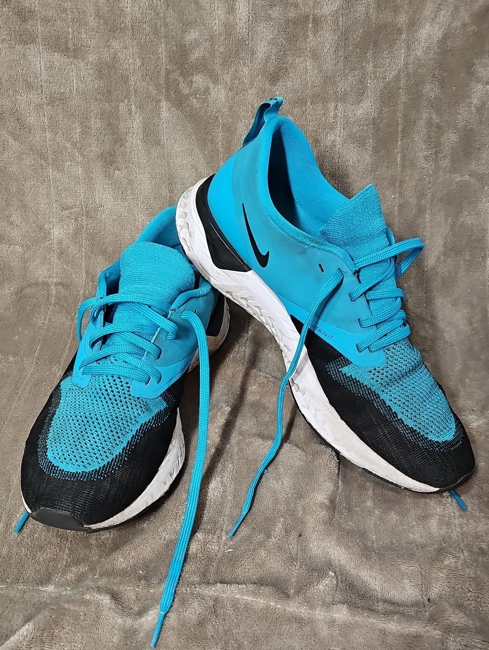 Nike Odyssey React 2 Flyknit running shoes in a Blue Lagoon colorwa